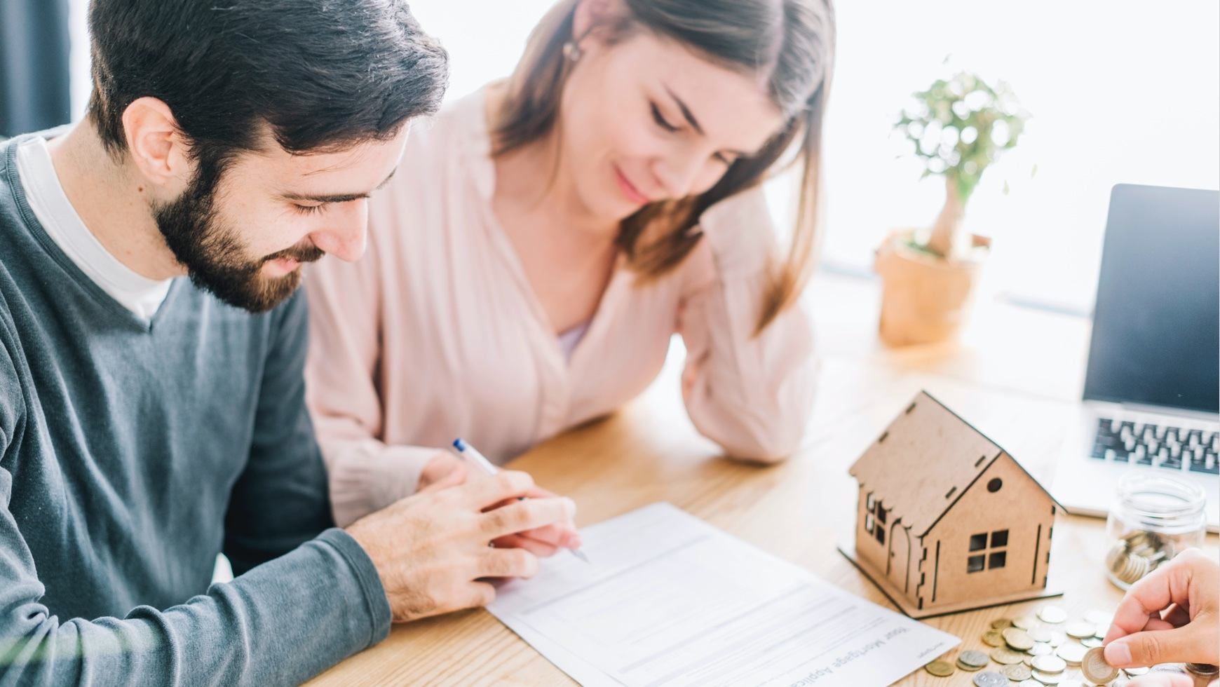 young couple reviewing document